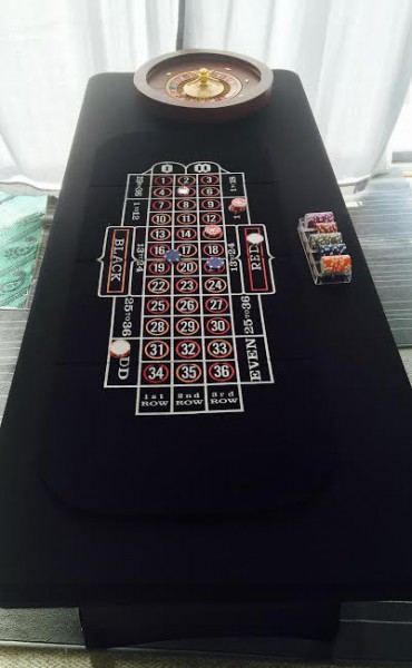 Roulette Table with Black Spandex skirting and spin wheel